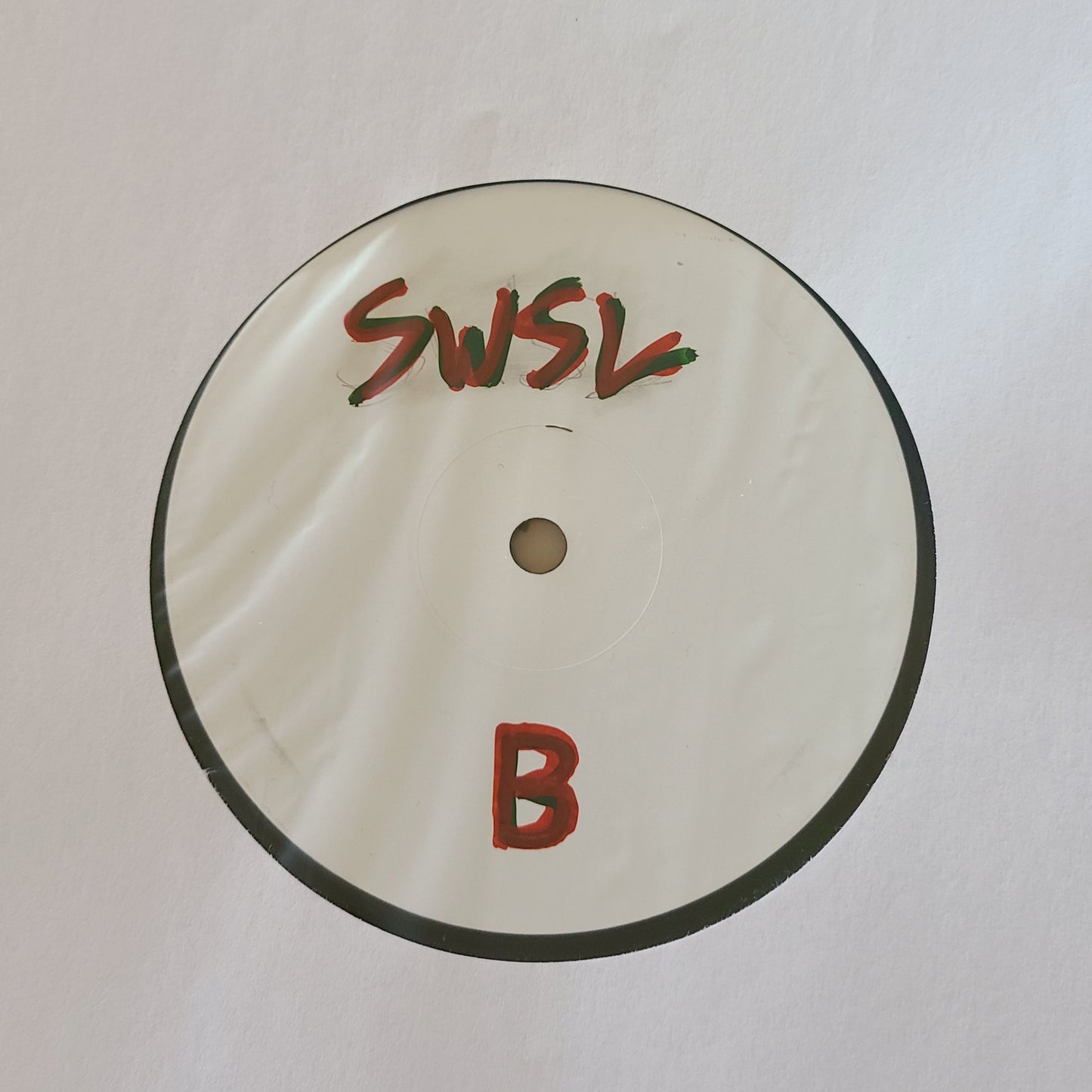 SANTA WEARS SAINT LAURENT TEST PRESSING