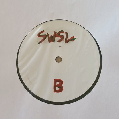 SANTA WEARS SAINT LAURENT TEST PRESSING